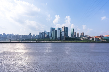 empty marble floor with city skyline