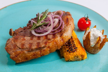 Steak on colored plate