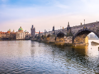 Fototapeta premium Charles bridge in Prague Czech Republic during sunset, close-up.Beautiful romantic for couple traveler.