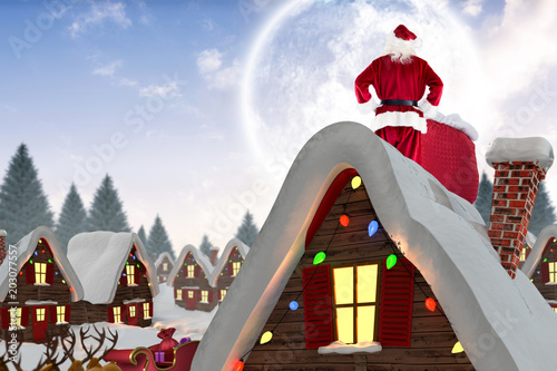 Santa With Sack Of Gifts Against Cute Christmas Village Under Full