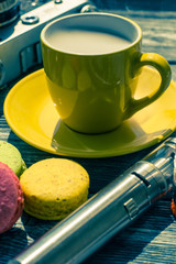 Still life with e-cig and jiuce on the wooden background