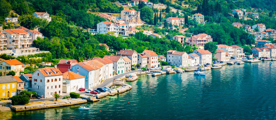 Kotor, Montenegro. Town along the bay of Kotor. - obrazy, fototapety, plakaty