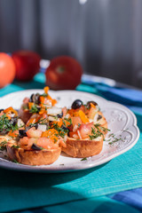 Bruschetta with tomatoes and olives