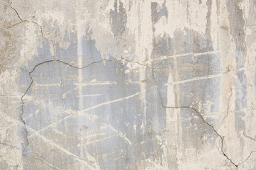 Abstract vintage textured old painted wall with stained and shabby uneven plaster  background