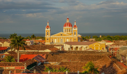 Granada, Nicaragua, Central America - April 3, 2017: Sunset in the colony city of Granada with the...