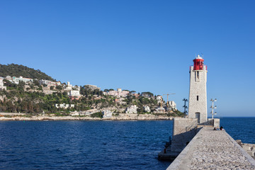 Fototapeta na wymiar Pier And Lighthouse In Nice