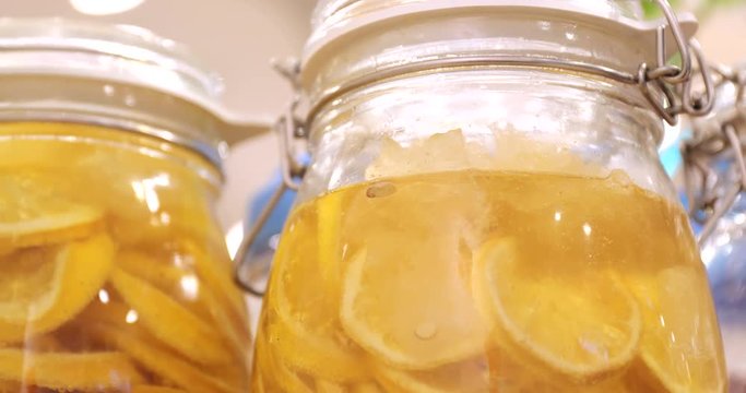 Glass bottle of compote in restaurant
