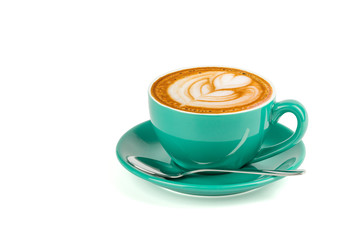 Side view of hot latte coffee with latte art in a green cup and saucer isolated on white background with clipping path inside.