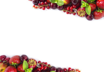 Mix berries isolated on a white. Ripe apricots, red currants, cherries and strawberries. Berries and fruits with copy space for text. Top view.