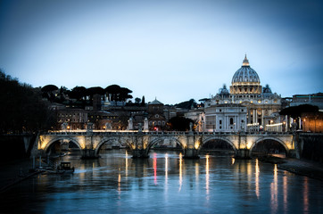 Fototapeta na wymiar View of the Tiber River in Rome with the Vatican and St. Peter’s Basilica in the background with a vignette.