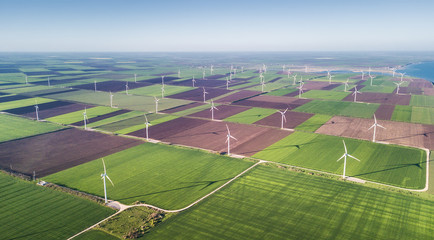 Wind power station on the field. Concept and idea of alternative energy development
