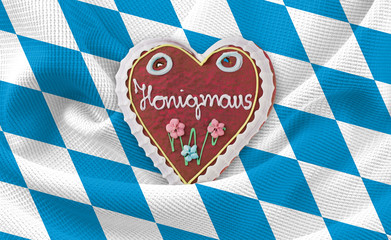 Obraz premium Oktoberfest Lebkuchenherz Honigmaus auf bayrisches Rautenmuster Tischdecke Flagge Hintergrund