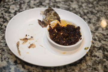 Dirty plates after eating with scrap food