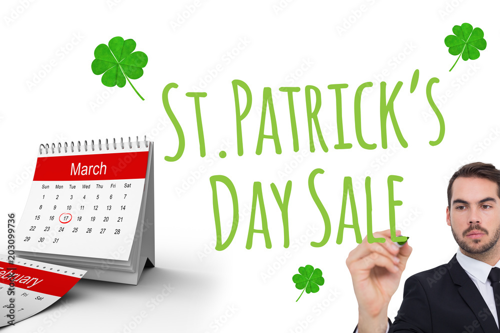 Poster Focused businessman writing with marker against shamrock