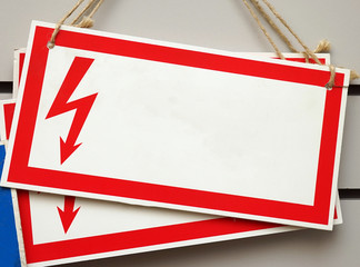 Rectangular sign with a red border and zipper. Electrical hazard. Empty template.