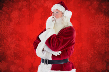 Santa is thinking about something against red paint splatter background