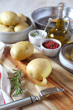 Peeled potatoes for making fried potatoes, kitchenware and ingredients