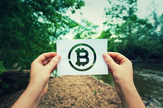 holding bitcoin symbol