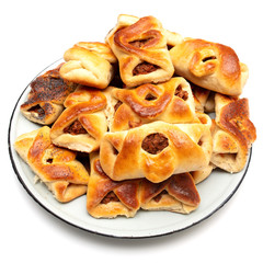 Buns with raisins and jam on a white background