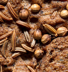 sesame seeds on black bread as a background