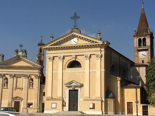 The oratory (on the left) and the parish church of San Pietro Apostolo, seen from Piazza Santa Toscana, Zevio, province of Verona. Italy