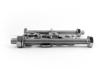 Long bolts in assembly with a nut and washer on a white background.