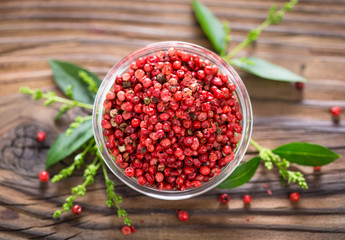 Fresh red peppercorns in the bowl