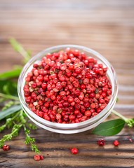 Fresh red peppercorns in the bowl