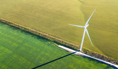 Wind power station on the field. Concept and idea of alternative energy development