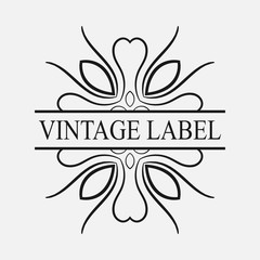 Retro ornamental label logo. Vintage luxury logotype for design of labels