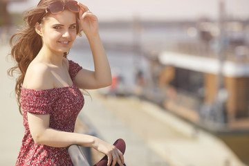 Bright lifestyle fashion portrait of sensual beautiful young woman