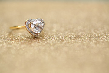 Diamond heart on gold ring