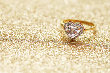 Diamond heart on gold ring