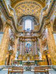 Altar in the transept of the Basilica of the Santi Ambrogio e Carlo al Corso, in Rome, Italy.