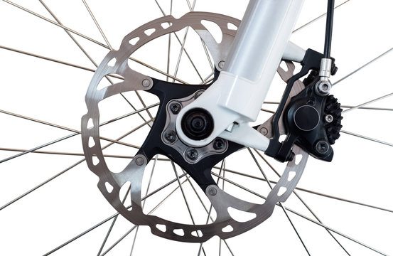 Hydraulic front disc brake on mountain bike. Isolated on a white background.