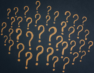 Yellow Question Marks on Black Background