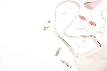 Woman fashion trendy stylish pastel pink accessories set on white background. Flat lay, top view.