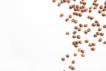 Hazelnut isolated on white background. Flat lay, top view.