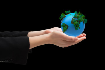 Businesswomans hands presenting against earth with forest