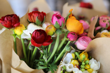 Colorful persian buttercup flowers or Ranunculus asiaticus bouquet in the flowers shop.