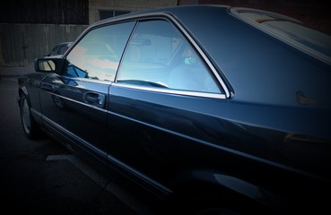 coupe from 80, auto youngtimer, dark background.