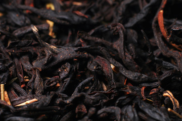 Black tea texture. Dry black sheet tea.