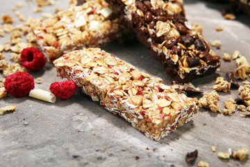 Granola bar. Healthy sweet dessert snack. Cereal granola bar with nuts, fruit and berries