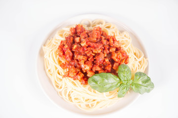 Spaghetti bolognese on a white background