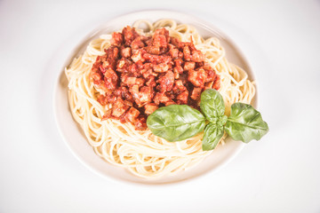 Spaghetti bolognese on a white background