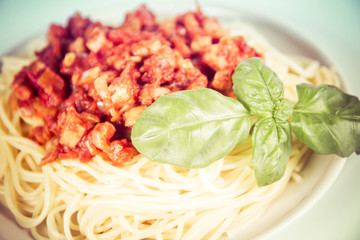 Spaghetti bolognese on a white background