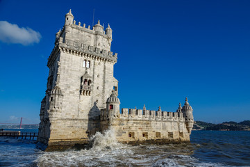 Lisbon Torre de Belem, high tide with wave breaking