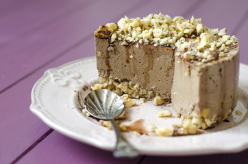 Cheesecake with carob nuts chocolate sauce and agar