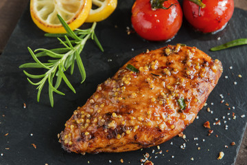 roasted chicken fillet breast with lemon tomato rosemary mustard seeds honey