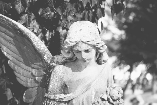 Death. Angel. Ancient sculpture. (pain, fear, future, the end concept)